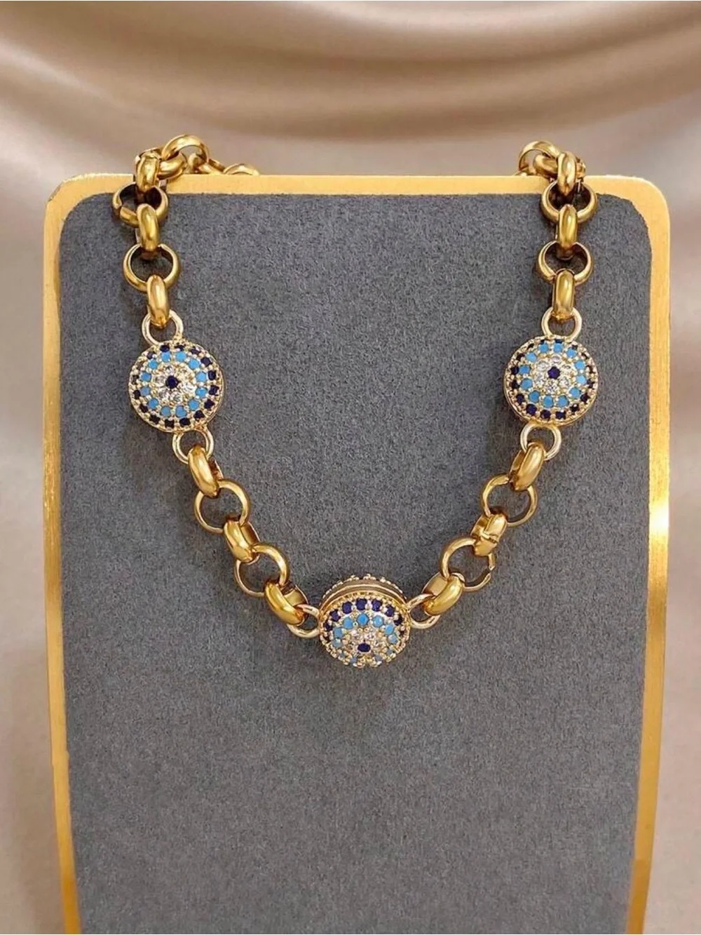 Gold-Tone Bracelet with Blue and White Crystal Discs
